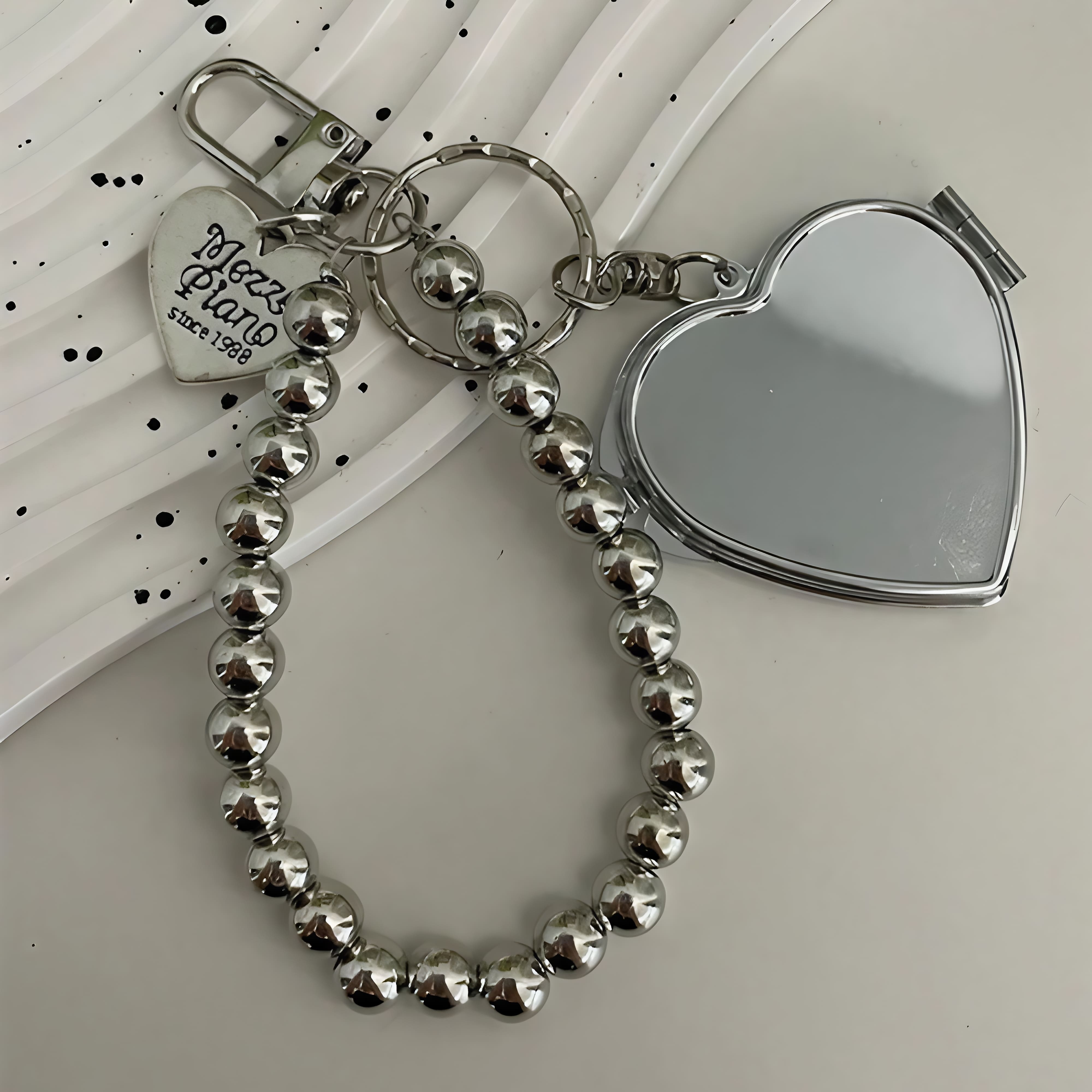 Charm Corazón con Espejo